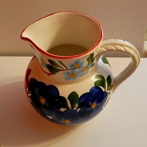 Pitcher made in Italy, 8" tall & 7" across. Multicolored flowers.